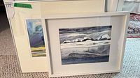 Two framed watercolors, front and partial rear painting visible