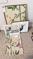 Group shot showing framed wave print and unframed bamboo textile scroll