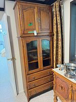 Full view of two-piece oak hutch showing overall design
