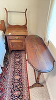 Nightstand and console table side by side against wall