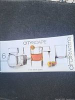 Front of boxed Circleware Cityscape 6-piece 2 oz shot glass set