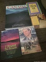 All five books laid out showing covers