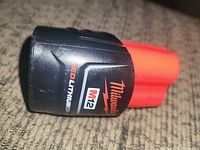Side view of Milwaukee REDLITHIUM M12 battery
