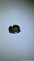 Front view of oval green sapphire