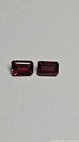 Front view of both octagon-cut garnets