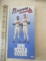 Front cover showing title, players, and price