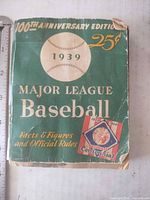 Front cover showing title, centennial badge and wear