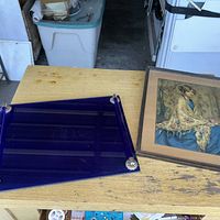 Cobalt blue glass tray and framed print side by side