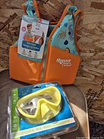 Aqua Swim School vest front with tags and Bestway mask package