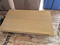 Top view of light maple veneer podium shelf