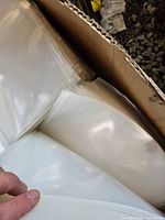 Bulk box of stacked clear polyethylene bags
