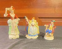 Front view three Victorian porcelain figurines