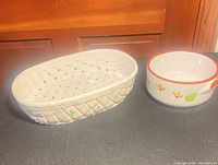 Bread basket and handled casserole side by side