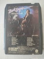 Front view of Bob Seger Beautiful Loser 8-track showing damaged label and program list