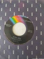 Front view of vinyl single in MCA sleeve