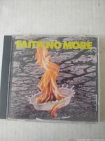 Front view of CD showing album cover and title
