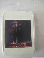 Front view showing Isaac Hayes stage photo label on cartridge