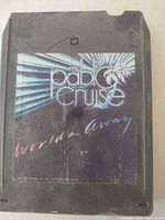 Front view of Pablo Cruise Worlds Away 8-track showing album art label