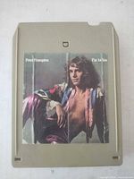Front view showing album art and cartridge color