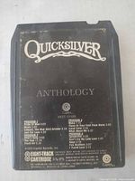 Front of 8-track cartridge showing title, label, catalog number, program listings, wear