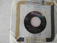 Front of record in sleeve showing title side