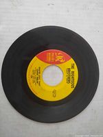 Full view of record showing A-side label with song title