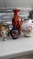 Group shot of all five ceramic items