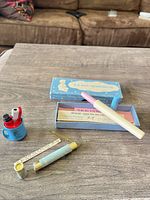 All items: thermometer set with box, cup holder with perfume vials