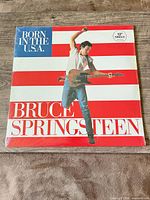 Front cover of sealed Born in the U.S.A. 12" single