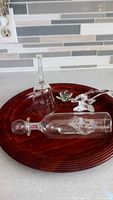 All four glass pieces on wooden tray