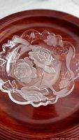 Close view scalloped dish with etched roses