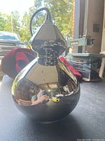 front view chrome gourd shade pendant with cord visible