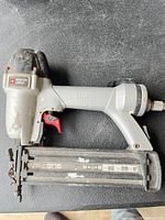 Left side view showing full tool and Porter-Cable logo