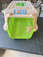 Front view of carrier with wire door closed