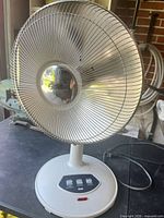 Front view of Super parabolic heater showing reflector and base