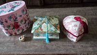 Group shot of all four decorative boxes on table