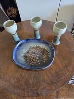 Overall view of three goblets and matching platter