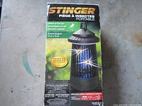 Box of Stinger portable insect trap showing product details