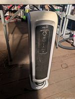 Front view of Fellowes AeraMax DX5 air purifier showing control panel and overall condition