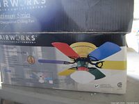 Box showing AirWorks Rainbow ceiling fan image and branding