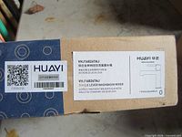 HUAYI faucet box showing brand and model