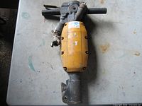 Full view pneumatic jackhammer on tabletop