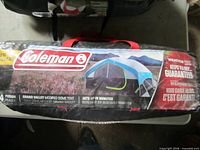 Coleman tent carry bag with branding and capacity info