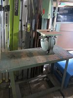 Full view of bandsaw on bench table