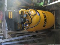 Front view showing DeWalt branding, tank size and overall form