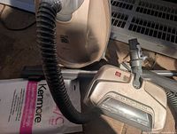 Canister vacuum body, powerhead, hose, and unopened bag pack