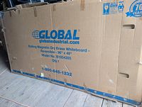 Box printed with Global Industrial Rolling Magnetic Dry Erase Whiteboard reversible 96" x 48" model B1854285