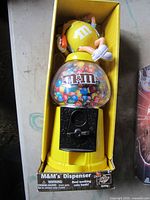 M&M’s yellow dispenser in original packaging