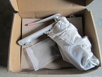 Faucet body, handle, hardware bag inside original box