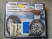 Front view of boxed snow tire chains